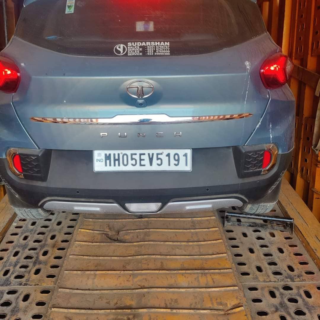 Car loaded inside enclosed carrier for safe intercity transport