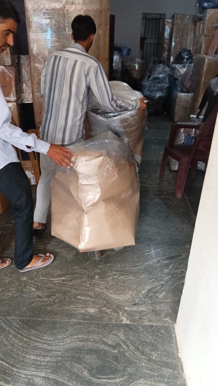 ShiftEzy crew carrying packed goods during house shifting